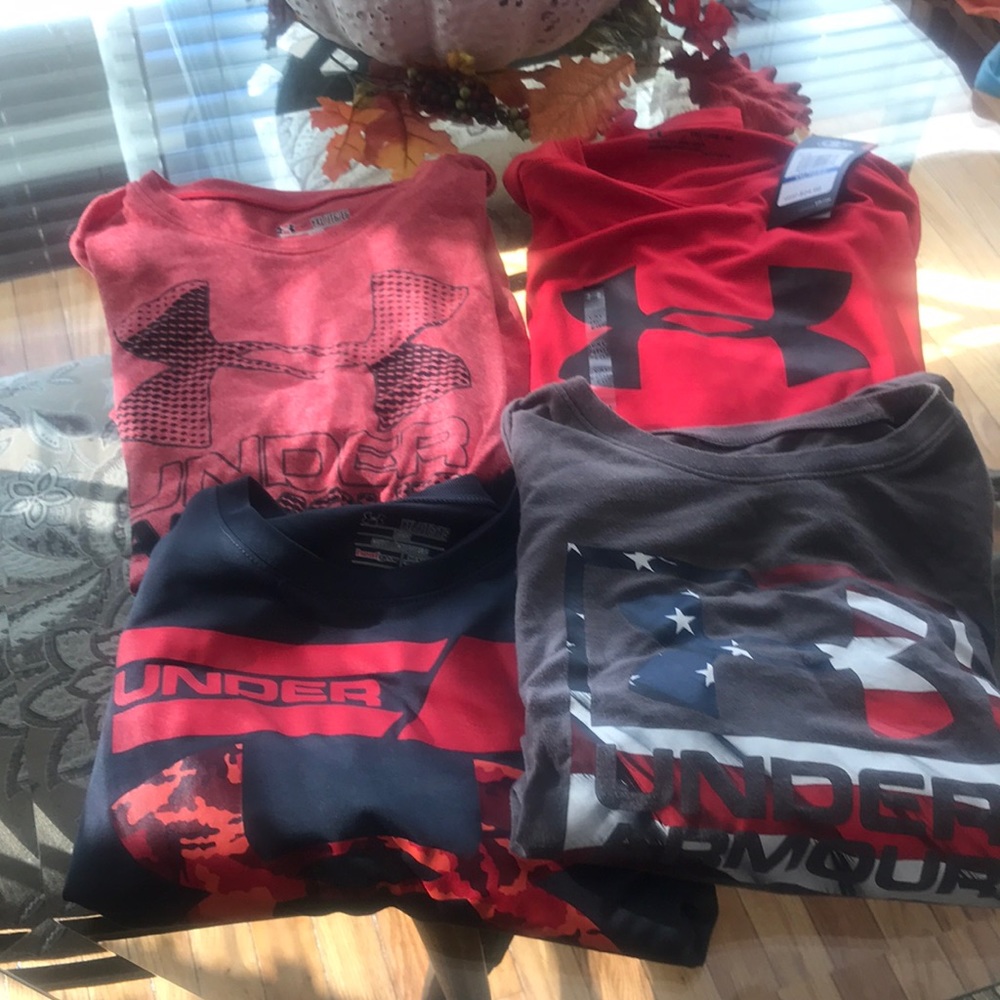 Four ua shirts